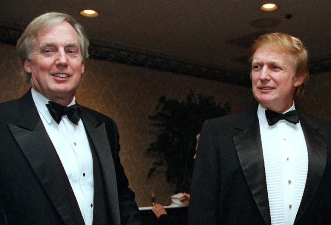 In this Nov. 3, 1999, file photo, Robert Trump, left, joins then real estate developer and presidential hopeful Donald Trump at an event in New York. (AP)