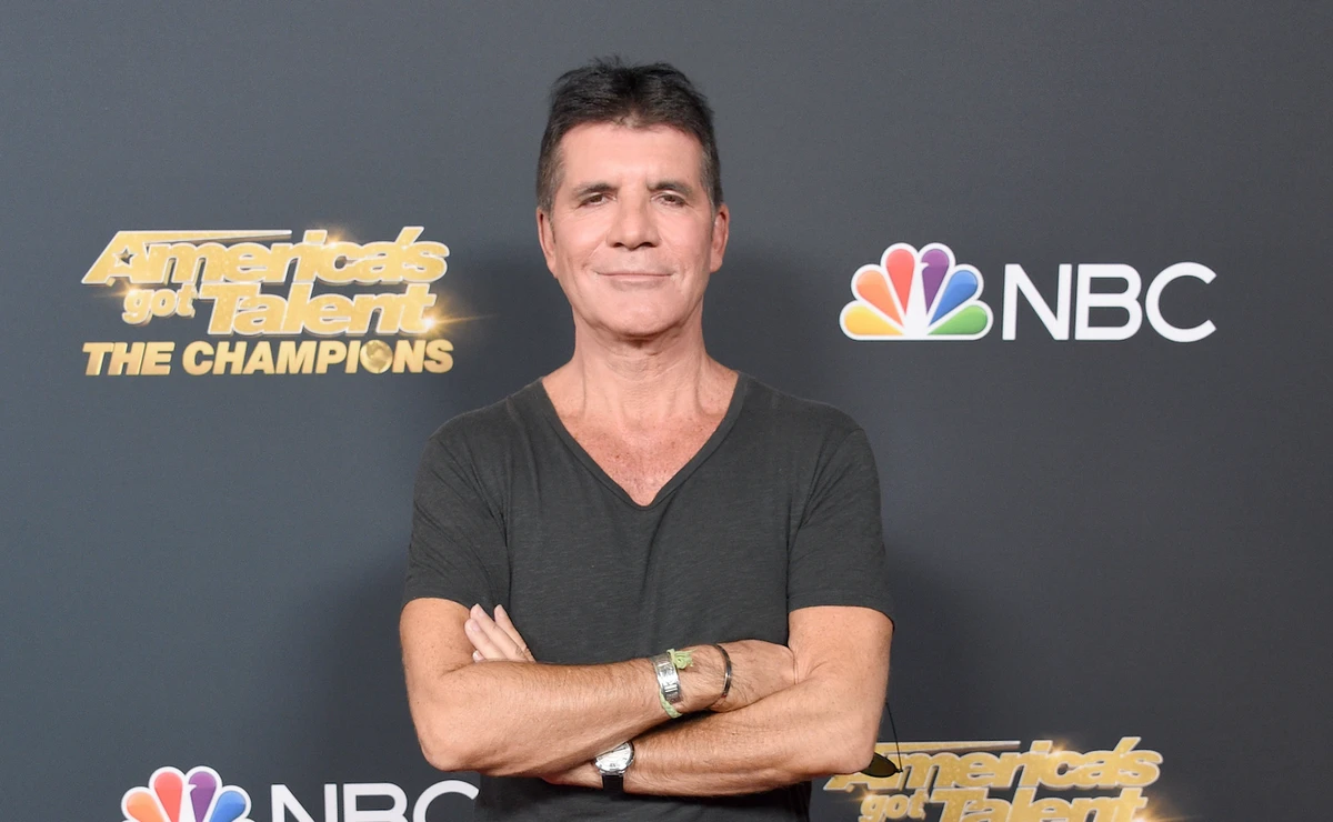 Simon Cowell returns home after back surgery