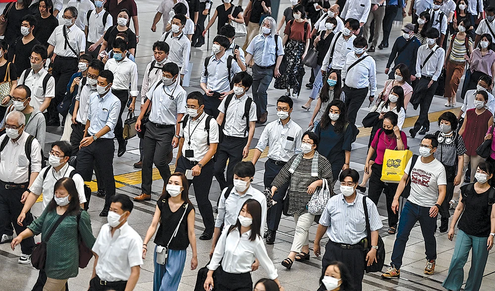 Japan’s record economic plunge wipes out Abe era gains