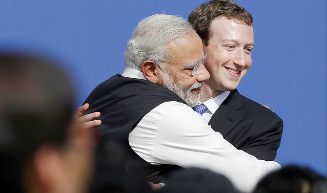 Facebook CEO Mark Zuckerberg, right, hugs Prime Minister of India Narendra Modi at Facebook offices in Menlo Park, Calif. Facebook India is under fire. (Files/AP)