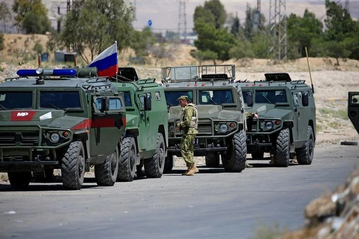 Russian military vehicles in eastern Ghouta, near Douma, Syria, April 23, 2018. (Reuters)