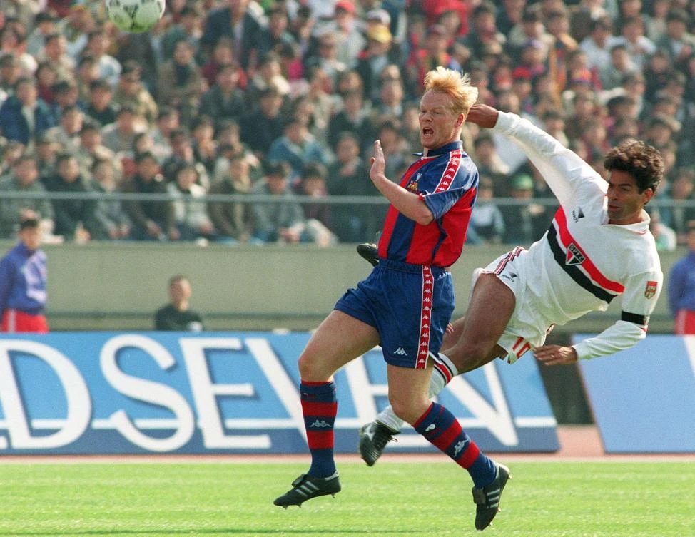 Sao Paulo’s Rai and Barcelona’s Ronald Koeman, left, contest possession in the Toyota European/South American Cup, in Tokyo, 13 December, 1992. (AFP)