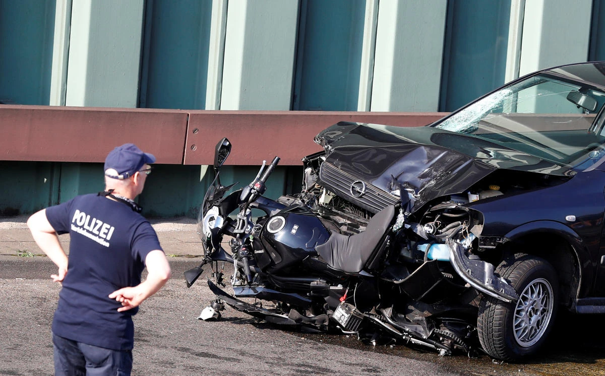 A police officer investigates the scene of a series of allegedly deliberate car crashes on highway A100 in Berlin, Germany, August 19, 2020. (REUTERS)