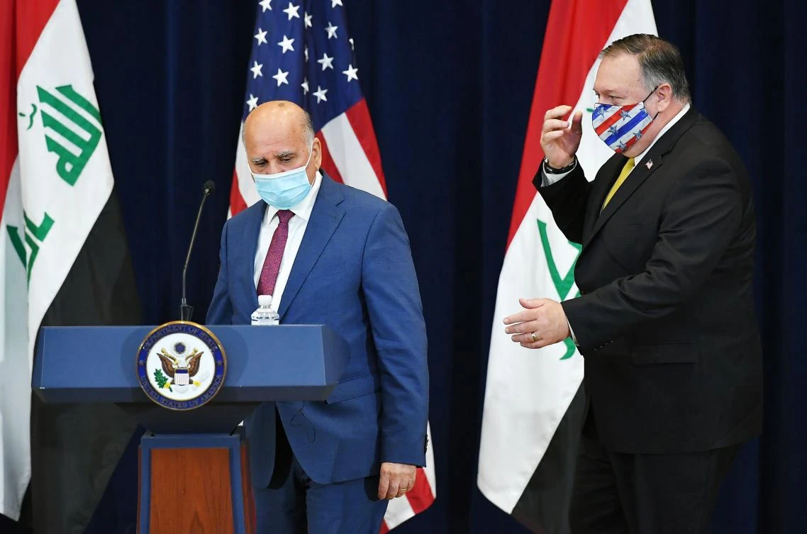 US Secretary of State Michael Pompeo(R) and Iraq's Foreign Minister Fuad Hussein arrive for a press conference at the State Department in Washington, DC on August 19, 2020. (AFP)
