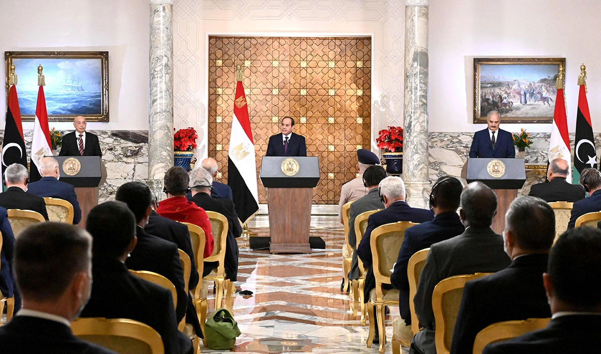 In this file photo released by the Egyptian Presidency on June 6, 2020, Egyptian President Abdel Fattah al-Sisi (C), Libyan commander Khalifa Haftar (R) and the Libyan Parliament speaker Aguila Saleh (L) take part in a joint press conference in the capital Cairo. (AFP)