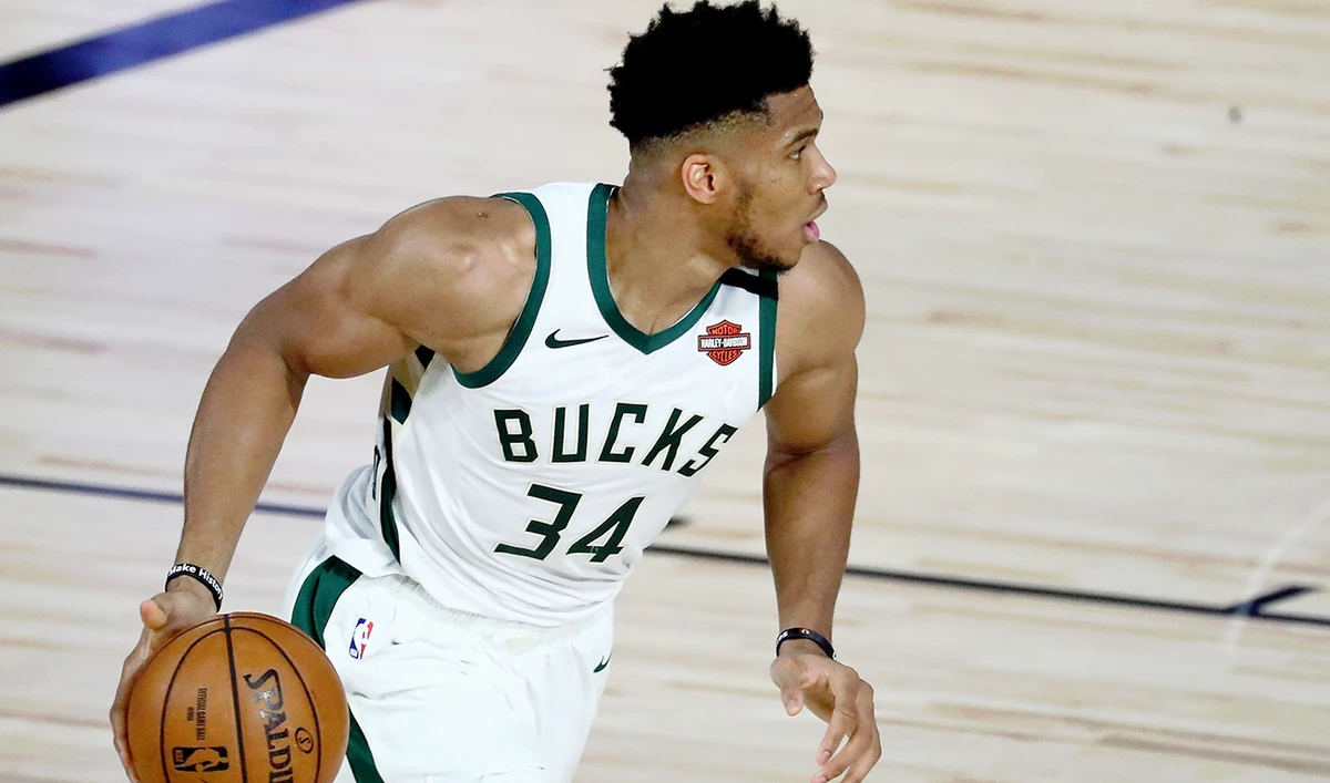 Milwaukee Bucks forward Giannis Antetokounmpo (34) dribbles against the Orlando Magic during the first half of Game 1 of an NBA basketball first-round playoff series at The Field House. (Reuters)