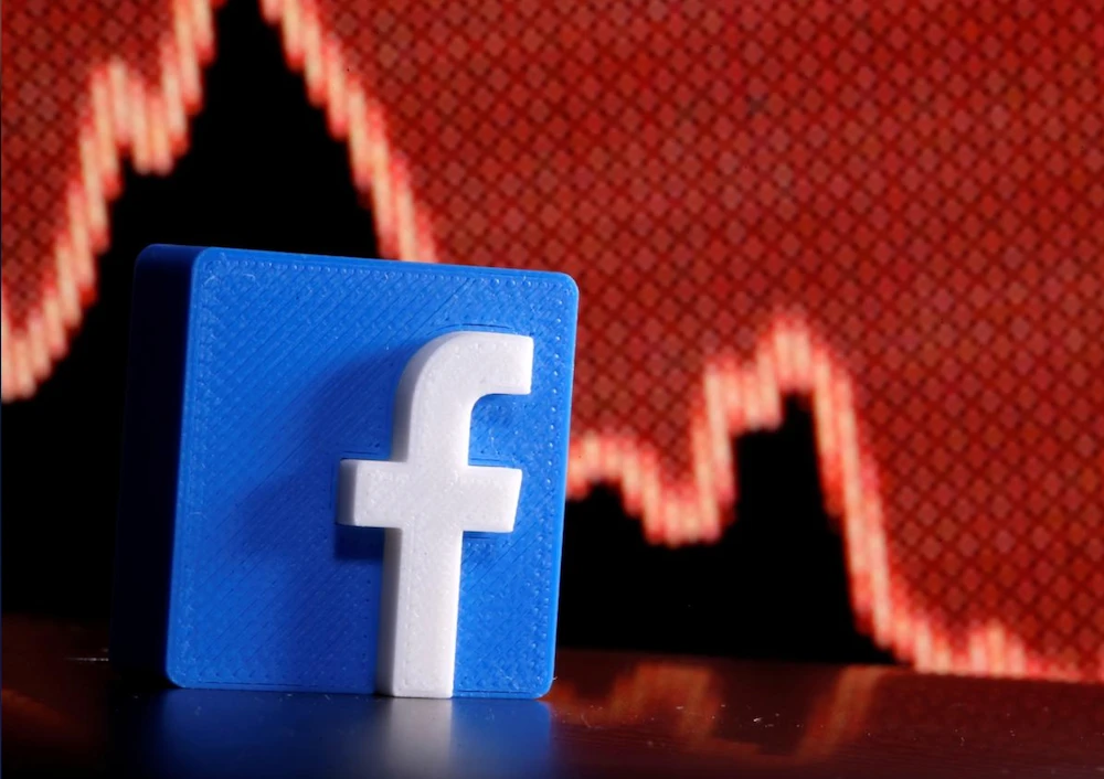 Facebook boots QAnon groups for ties to violence