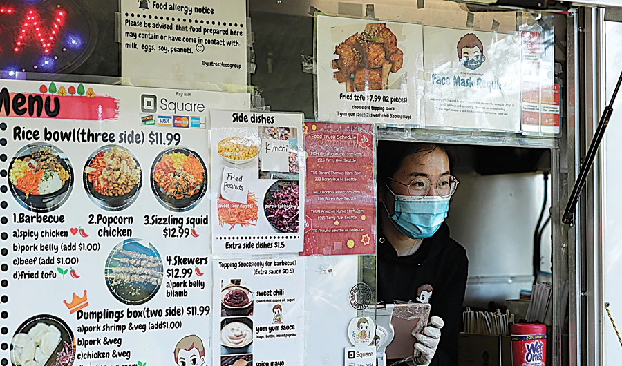 Yuli Shen, the owner of YS Street Food Group, discovered her potential customers for her food truck in the hilltop Seattle-area neighborhood through Facebook. (AP)