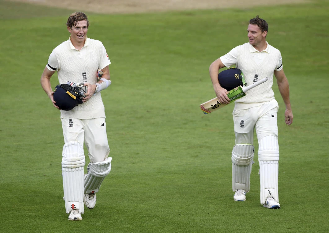 England's Zak Crawley, left, and Jos Buttler walk off the field at the end of England's innings of the third cricket Test match between England and Pakistan, at the Ageas Bowl in Southampton. (AP)