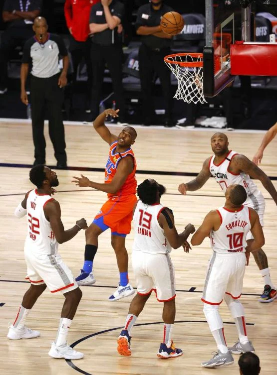 Chris Paul of the Oklahoma City Thunder attempts a hook shot during Game Three of their playoff series with the Houston Rockets on August 22, 2020 in Lake Buena Vista, Florida. (Mike Ehrmann/Getty Images/AFP)