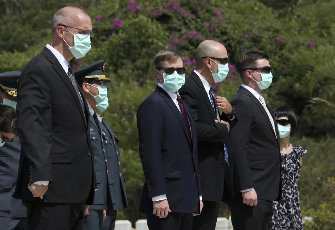 The officials of American Institute in Taiwan (AIT) attend a ceremony commemorating the 62nd anniversary of deadly attack by China on Kinmen island, in Kinmen, Taiwan, Sunday, Aug. 23, 2020. (AP)
