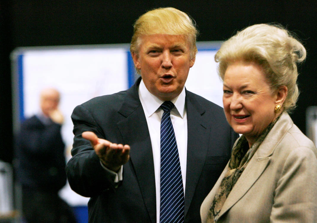 Donald Trump (L) gestures as he stands next to his sister Maryanne Trump Barry, during a break in proceedings of the Aberdeenshire Council inquiry into his plans for a golf resort, Aberdeen, northeast Scotland June 10, 2008. (Reuters)