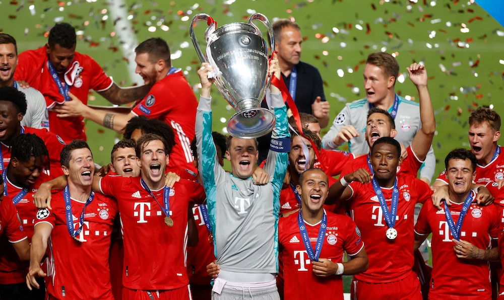 Bayern's goalkeeper Manuel Neuer lifts the trophy after Munich won the Champions League final against Paris Saint-Germain. (AP)