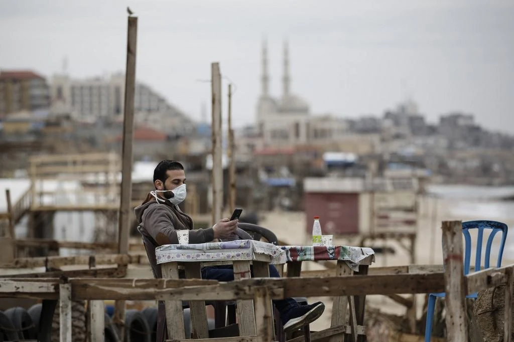 Gaza reported its first cases of COVID-19 in the general population on Monday, as authorities confirmed four infections at a refugee camp and security forces declared a full lockdown for 48 hours. (AFP/File Photo)