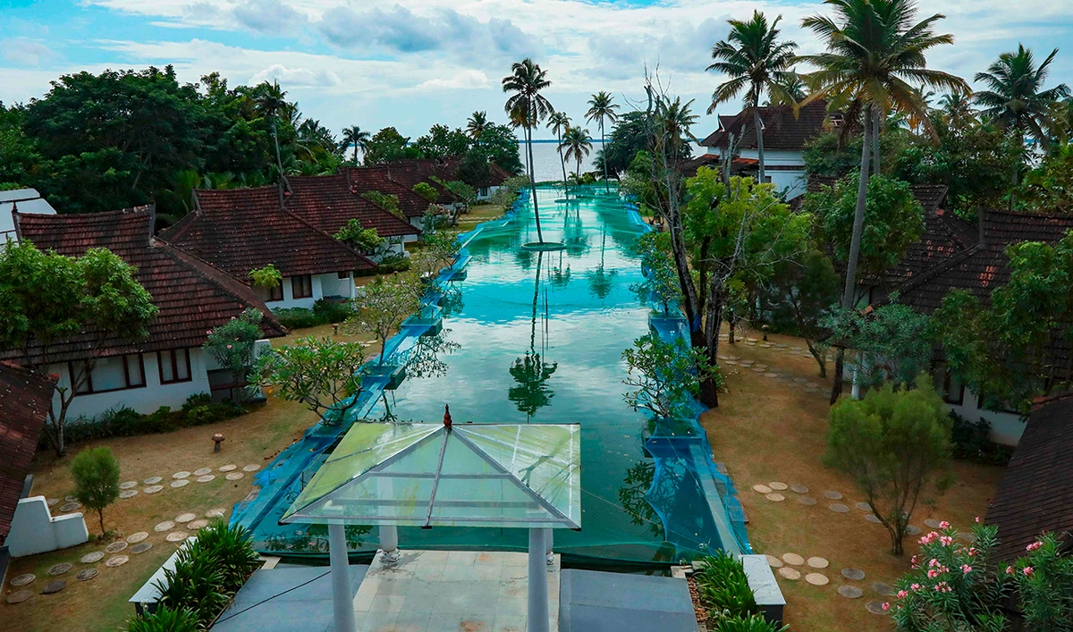In this picture taken on August 23, 2020, a general view of a swimming pool that has been turned into a fish farm is pictured at Aveda Resort in Kumarakom, in Kerala state. (AFP)