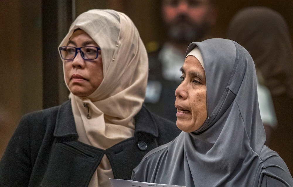 Noraini Abbas Milne, right, mother of 14-year-old mosque shooting victim, Sayyad, makes her victim impact statement during the sentencing hearing for Australian Brenton Harrison Tarrant at the Christchurch High Court. (AP)