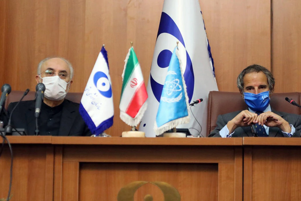 The head of Iran's atomic agency Ali Akbar Salehi (L) and Director General of the International Atomic Energy Agency (IAEA) Rafael Mariano Grossi hold a joint press conference in Tehran on August 25 2020. (AFP)