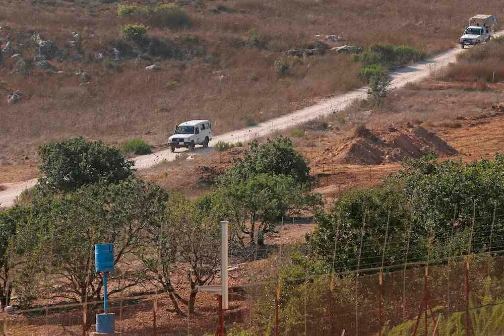 United Nations peacekeeping forces (UNIFIL) patrol along the border with Israel, in the southern Lebanese village of Houla, August 26, 2020. (AFP)