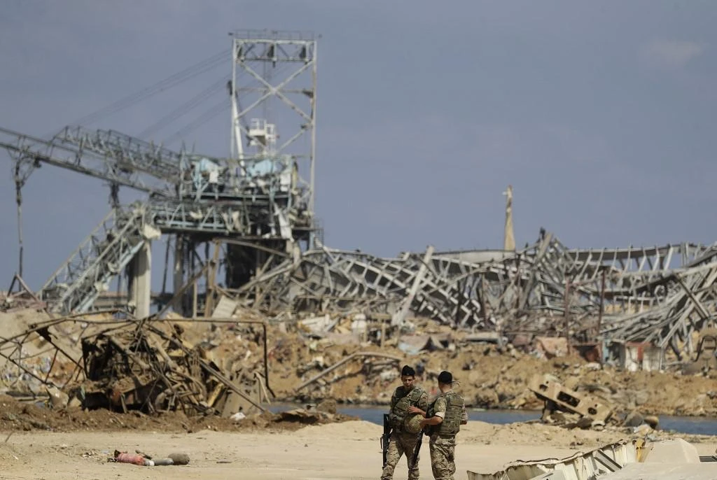Lebanese President Michel Aoun initially promised a swift investigation into why highly explosive material stored unsafely for years detonated on Aug. 4. (File/AFP)
