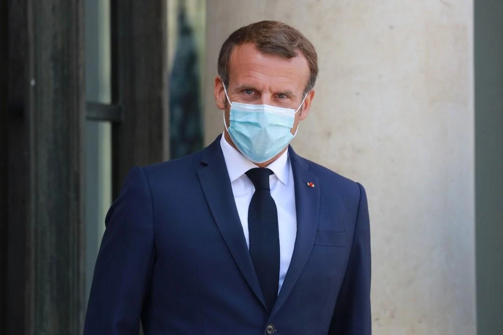 French President Emmanuel Macron will head to Beirut next week to pressure local politicians into pressing ahead with the creation of a government. (File/AFP)