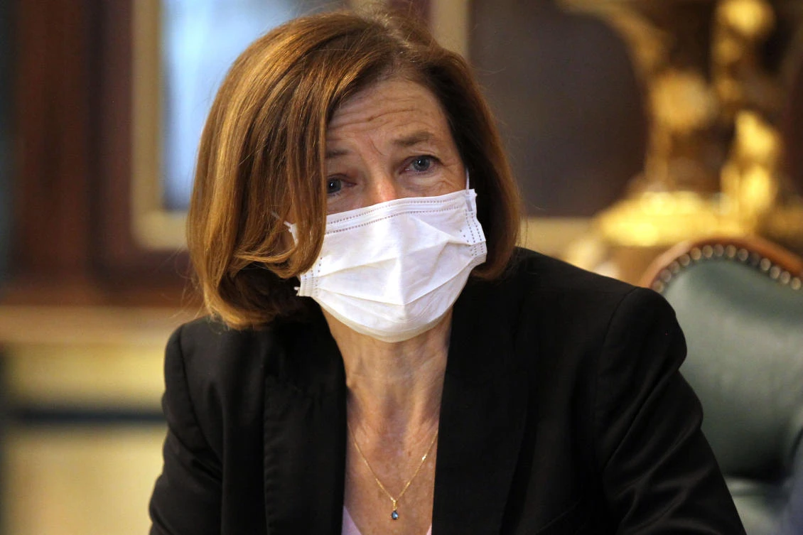 French Defense Minister Florence Parly wears a facemask to avoid the spread of the Covid-19 coronavirus as she attends a meeting with her Iraqi counterpart in Baghdad on August 27, 2020. Parly held talks in Baghdad today, pledging continued support for Iraq’s fight against remnants of the Daesh group. (AFP)