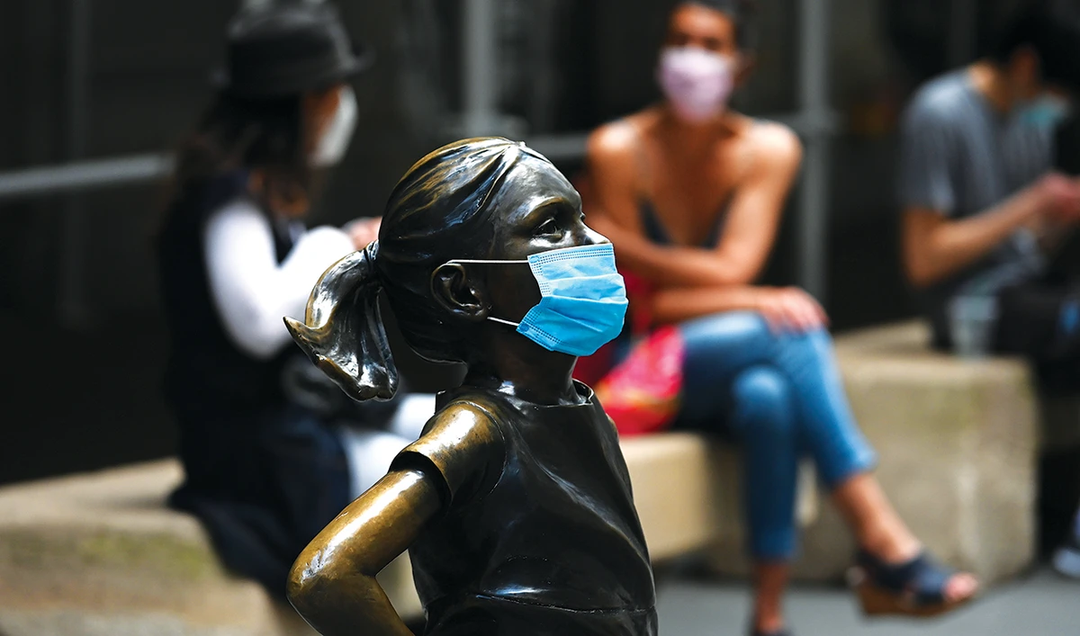 The ‘Fearless Girl’ bronze sculpture is seen near the New York Stock Exchange building. (AFP/File)