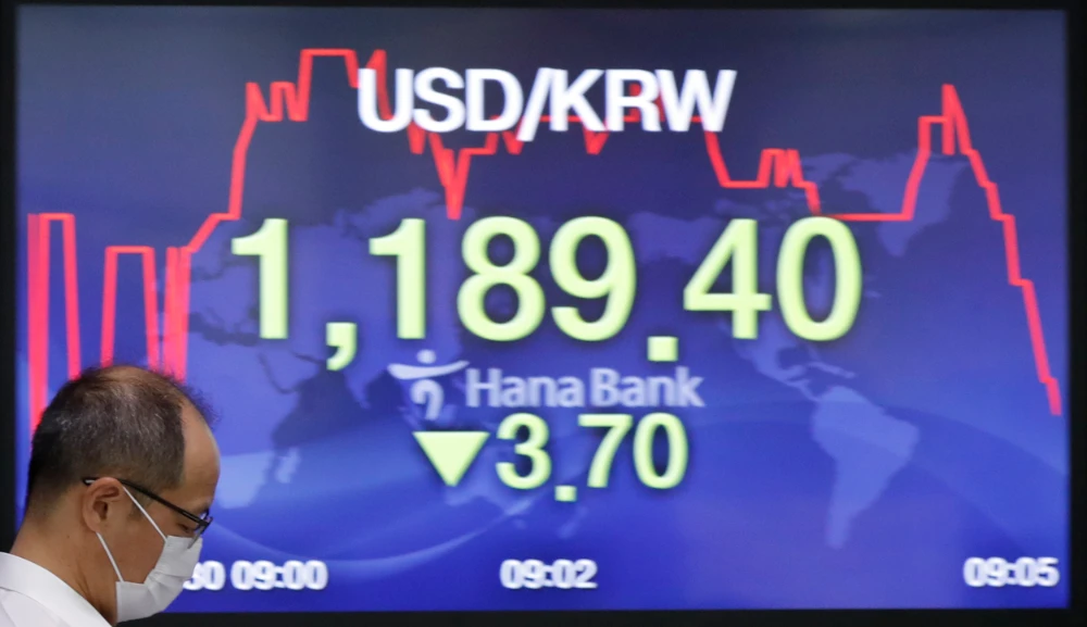 The US dollar is the world’s reserve currency and the most traded in global currency markets. (AP Photo/Lee Jin-man)