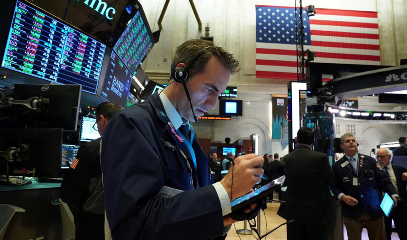 A trader works at the New York Stock Exchange (NYSE) in New York, US. (Reuters)