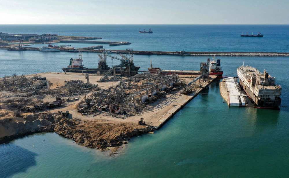 An aerial view of the flattened warehouse at the port of Lebanon's capital Beirut that was ravaged by an explosion in early August. (AFP)
