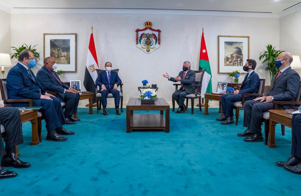 Jordanian King Abdullah II, center right, meets with Egyptian President Abdel Fattah El-Sisi, center left, on Aug. 25,2020 ahead of the summit in the capital Amman. (AFP)