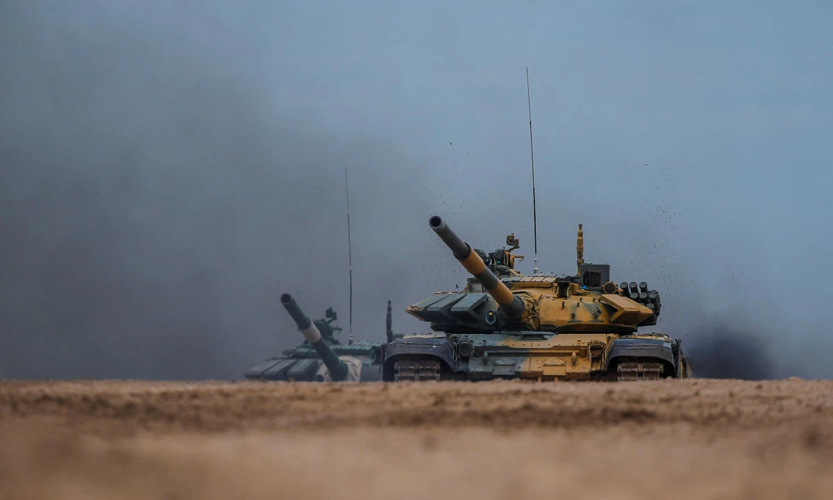 T-72 B3 tanks operated by crews from Kazakhstan and Uzbekistan drive during the Tank Biathlon competition at the International Army Games 2020 in Alabino, outside Moscow, Russia September 2, 2020. REUTERS/Maxim Shemetov