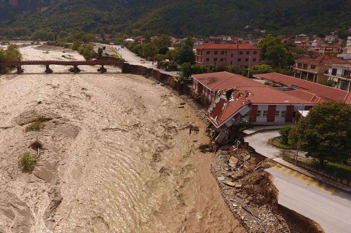 A view of a partially collapsed medical center next to the flooded Pamisos river, following a storm in the town of Mouzaki, in central Greece, September 19, 2020. Picture taken with a drone. REUTERS/Giannis Floulis