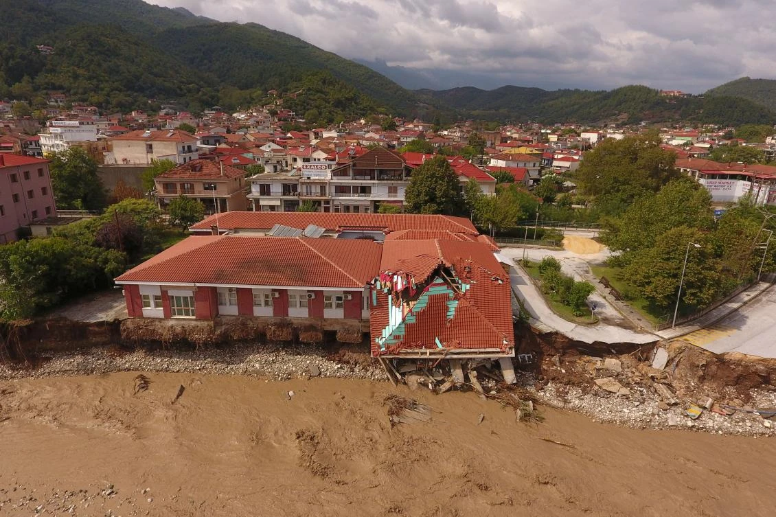 A view of a partially collapsed medical center next to the flooded Pamisos river, following a storm in the town of Mouzaki, in central Greece, September 19, 2020. Picture taken with a drone. REUTERS/Giannis Floulis