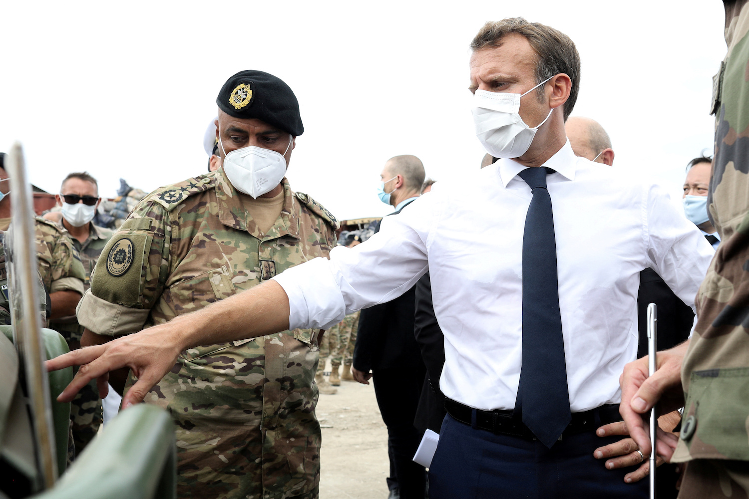 French President Emmanuel Macron meets members of the military mobilised for the reconstruction of the port of Beirut, in Beirut, Lebanon September 1, 2020. (Reuters)