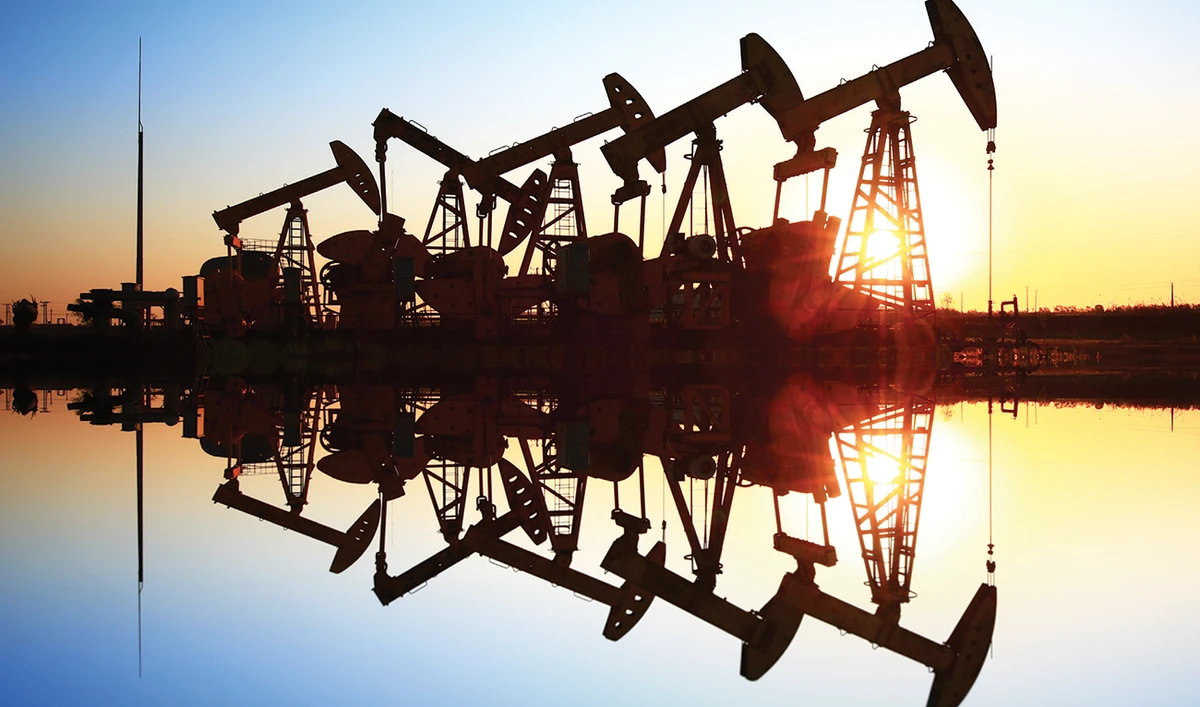 Oil firms face a battle with big utilities to compete for a small pool of renewable energy assets, as valuations rise and fossil fuel prices suffer. (Shutterstock)