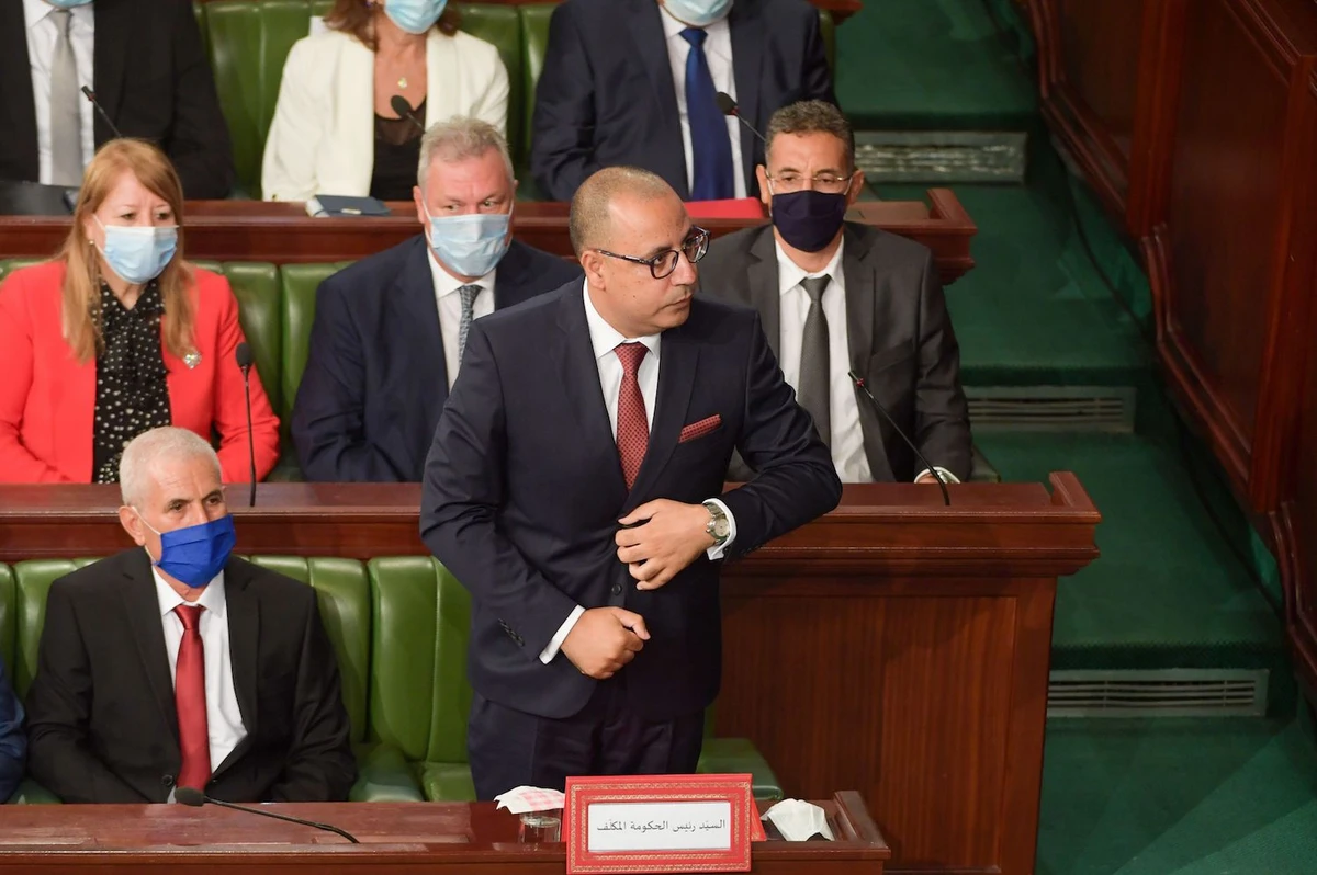 Hichem Mechichi, Prime Minister-designate of Tunisia, stands to deliver a speech to members of parliament as they hold session of confidence in the capital Tunis on September 1, 2020. (AFP)
