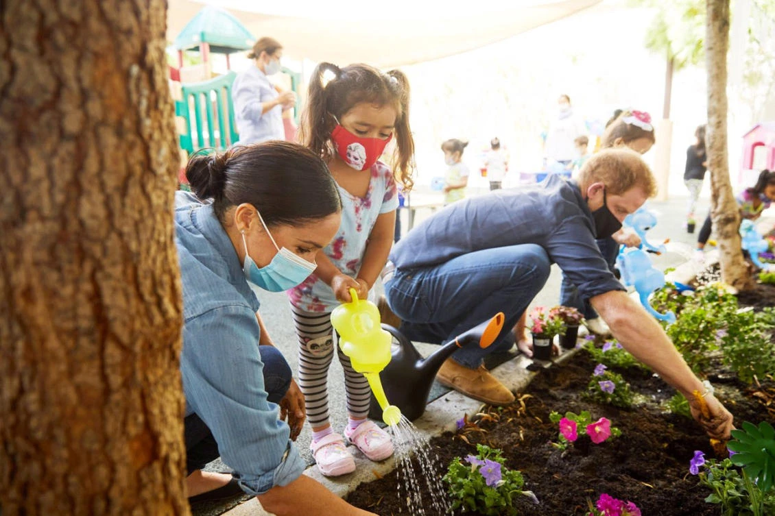 Prince Harry and Meghan Markle, the Duke and Duchess of Sussex, plant flowers and forget-me-nots during a visit to the Assistance League Los Angeles’ Preschool Learning Center in Los Angeles, California, US August 31, 2020. (Reuters)