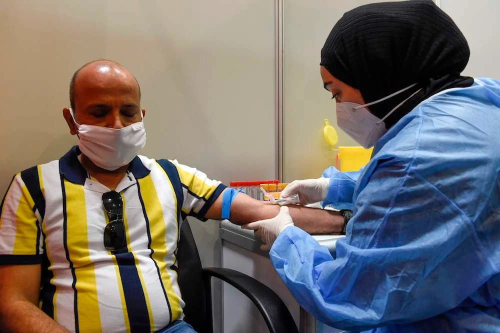 Chinese drug giant Sinopharm began testing the inactivated COVID-19 jab in Bahrain earlier this month after starting a similar trial on 15,000 subjects in the nearby United Arab Emirates in July. (AFP)