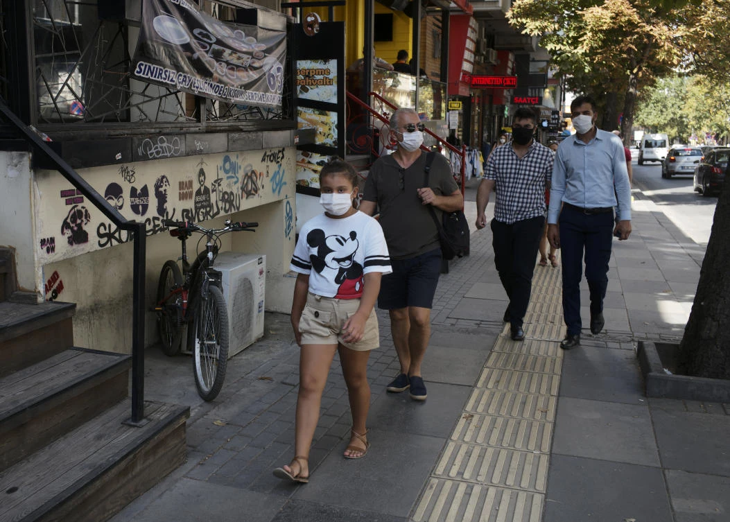 Turkey’s Health Minister Fahrettin Koca says the country is experiencing ” the second peak of the first wave ” of the coronavirus outbreak. (File/AP)