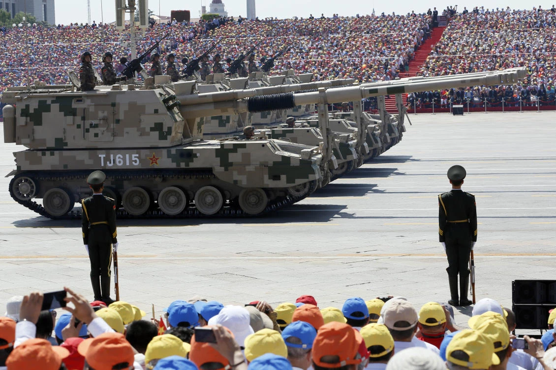 Chinese 155mm self-propelled howitzers take part in a parade commemorating the 70th anniversary of Japan’s surrender during World War II held in front of Tiananmen Gate in Beijing on Sept. 3, 2015. (File/AP)