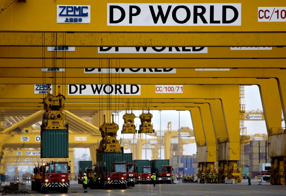 Cranes off load containers at the Jebel Ali Port, in Dubai, which is managed by DP World. (AP Photo/Kamran Jebreili, File)