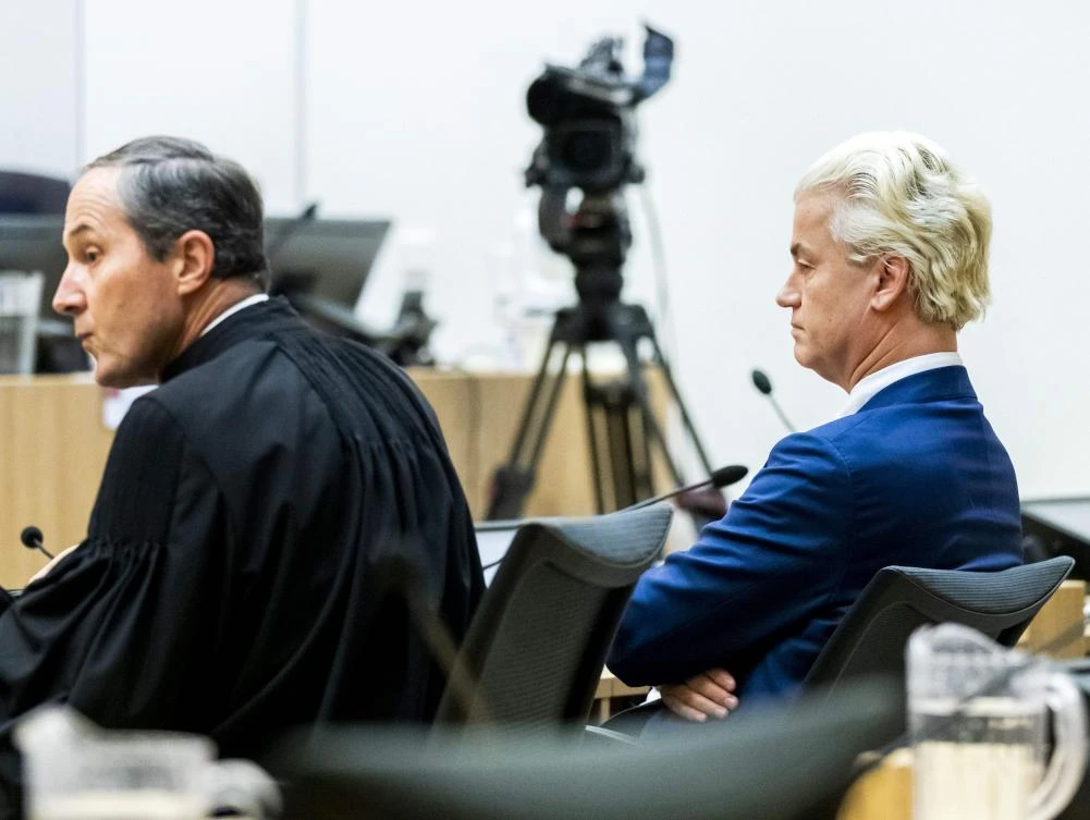 Lawyer Geert-Jan Knoops and Dutch PVV leader Geert Wilders sit in the court of appeal in The Hague, during the court’s ruling in the ‘fewer-Moroccan’ hate speech trial on September 4, 2020. (Netherlands OUT/AFP/ANP/Remko de Waal)