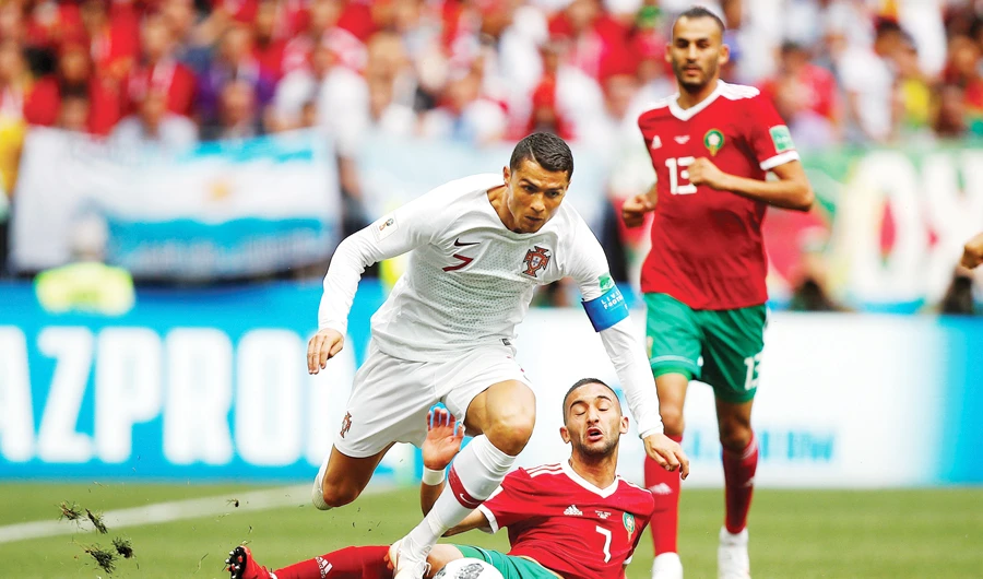 Cristiano Ronaldo, left, in action against Morocco. The star has 99 goals in 164 international matches but the FPF gave no indication whether he will be fit for the upcoming match. Portugal is playing Croatia on Saturday. (Reuters/File)