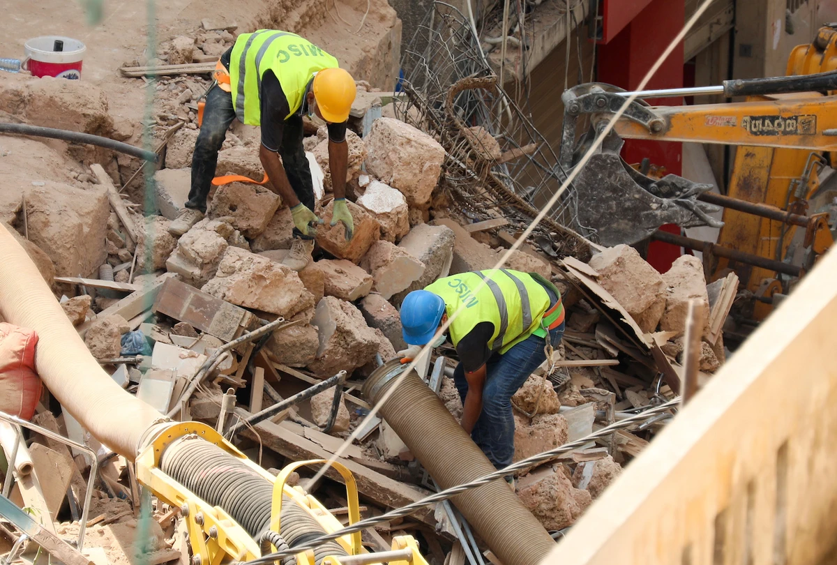 Volunteers dig through the rubble of buildings which collapsed due to the explosion at the port area, after signs of life were detected, in Gemmayze, Beirut, Lebanon September 5, 2020. (Reuters)