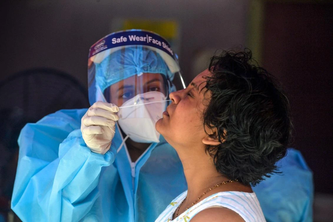 India is seeing a coronavirus resurgence with over 70 percent of its nearly 1.4 billion people still susceptible to infections. (AFP)