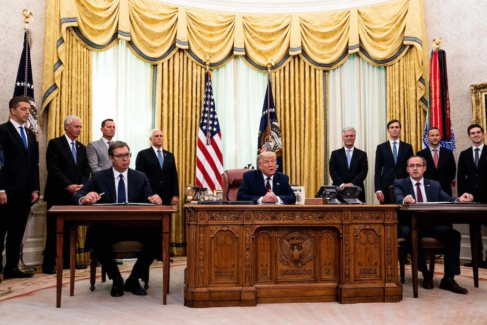 U.S. President Donald Trump (C) participates in a signing ceremony and meeting with the President of Serbia Aleksandar Vucic (L) and the Prime Minister of Kosovo Avdullah Hoti (R) in the Oval Office of the White House on September 4, 2020 in Washington, DC. (AFP)