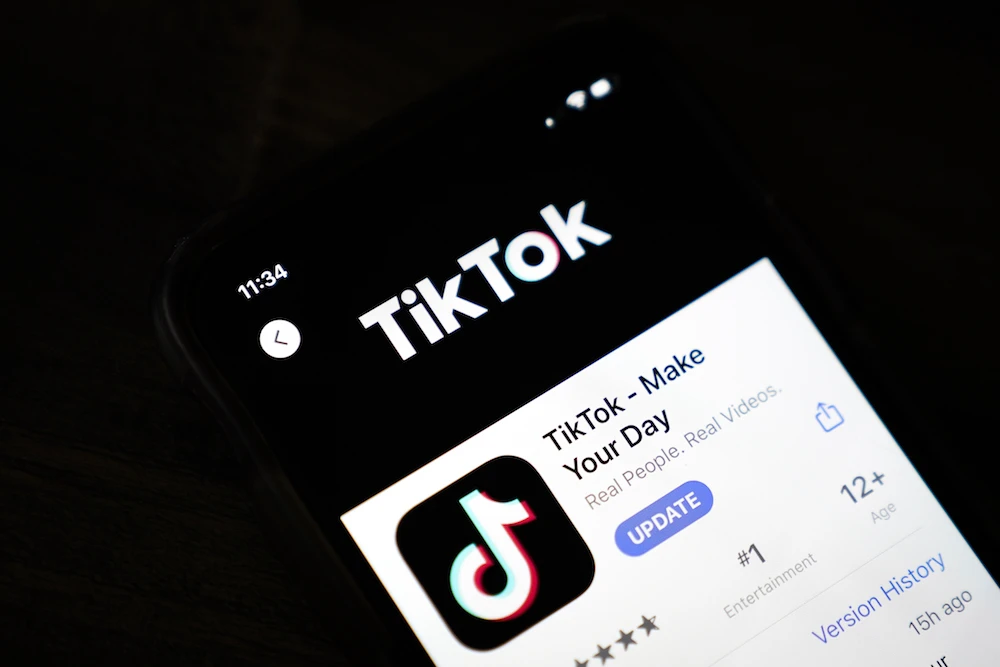 The download page for the TikTok app is displayed on an Apple iPhone on August 7, 2020. (AFP)