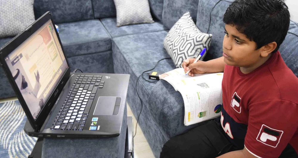 With COVID-19 causing school closures, and children across the Kingdom attending online classes. (SPA)