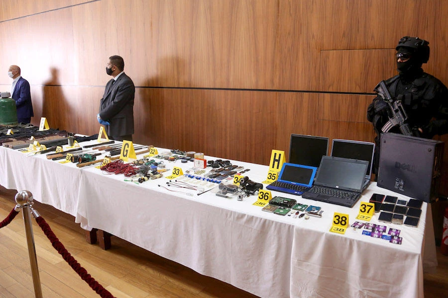 A picture taken on September 11, 2020, during a press conference by the director of Morocco's Central Bureau of Judicial Investigation (BCIJ), shows various equipment seized as a result of the dismantling of a Daesh-affiliated cell that was planning suicide bombings. (AFP)
