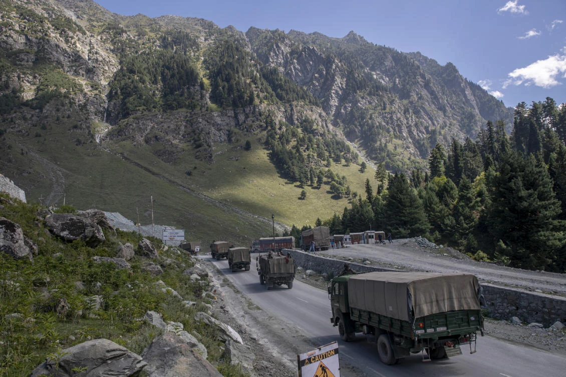 An Indian army convoy moves on the Srinagar- Ladakh highway at Gagangeer of the Indian-controlled Kashmir on Sept. 9, 2020. (AP)